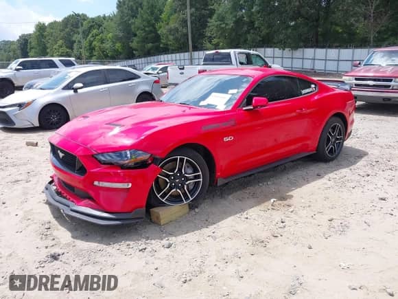 2020 Ford Mustang GT with VIN 1FA6P8CF3L5148144, listed as a IAAI auction lot 42801180 with 84,571 mi miles and . Bid and sale history available at DreamBid. Image 2.