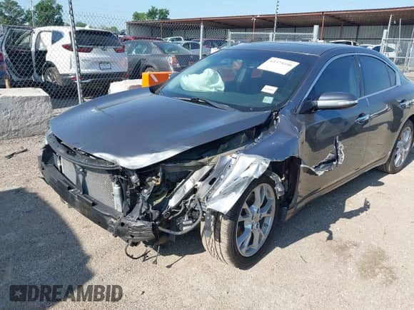 2014 Nissan Maxima SV with VIN 1N4AA5AP6EC443310, listed as a IAAI auction lot 42373390 with 146,828 mi miles and . Bid and sale history available at DreamBid. Image 6.