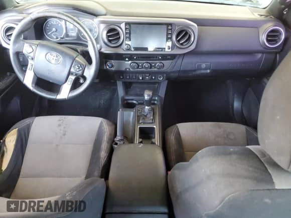 2020 Toyota Tacoma SR5 с VIN 3TMBZ5DN4LM024014, выставлен на аукционе Copart как лот 58260065 с пробегом 145 836 миль миль и Списание • Salvage title. История ставок и продаж доступна на DreamBid. Изображение 8.