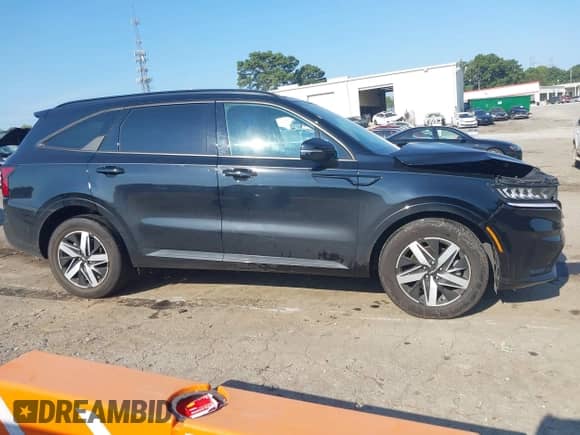 2023 Kia Sorento S with VIN 5XYRL4LC2PG197348, listed as a IAAI auction lot 43146392 with 57,061 mi miles and . Bid and sale history available at DreamBid. Image 13.