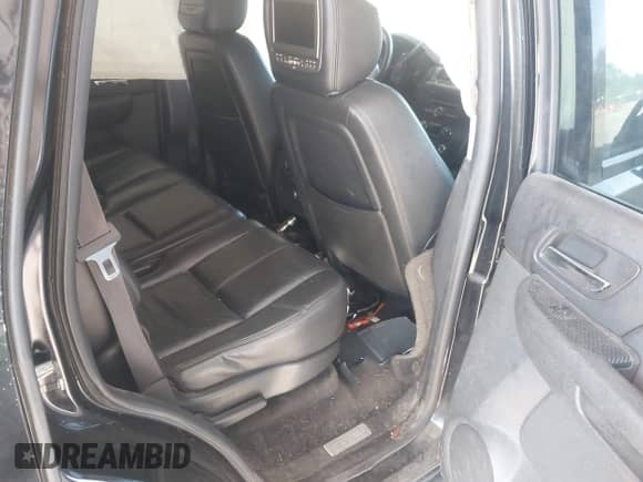 2008 Chevrolet Tahoe LTZ z VIN 1GNFK13078J228581, wystawiony jako IAAI lot #42561871 z przebiegiem Nie podano mil oraz . Historia ofert i sprzedaży dostępna na DreamBid. Obrazek 8.