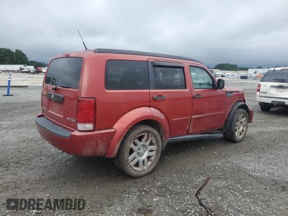 2011 Dodge Nitro Heat with VIN 1D4PT4GK8BW522477, listed as a Copart auction lot 68395045 with 123,116 mi miles and Salvage title. Bid and sale history available at DreamBid. Image 3.