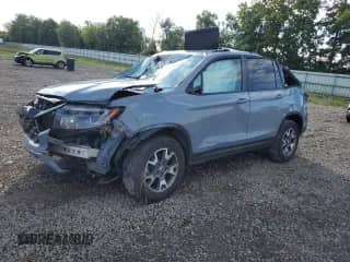 2022 Honda Passport TrailSport with VIN 5FNYF8H65NB002182, listed as a Copart auction lot 70024075 with Not provided miles and Salvage title. Bid and sale history available at DreamBid. Image 1.
