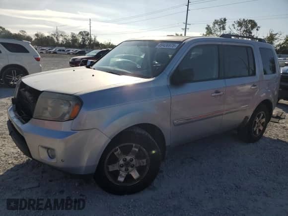 2010 Honda Pilot Touring с VIN 5FNYF4H87AB003161, выставлен на аукционе Copart как лот 89436975 с пробегом 160 834 миль миль и Чистый • Clean title. История ставок и продаж доступна на DreamBid. Изображение 1.