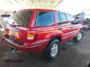 2004 Jeep Grand Cherokee Laredo with VIN 1J4GW48S34C379651, listed as a IAAI auction lot 43466624 with 175,652 mi miles and . Bid and sale history available at DreamBid. Image 4.