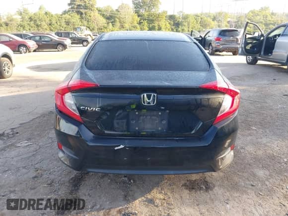 2016 Honda Civic LX z VIN 19XFC2F56GE206263, wystawiony jako IAAI lot #43353331 z przebiegiem 181 521 mil mil oraz . Historia ofert i sprzedaży dostępna na DreamBid. Obrazek 17.