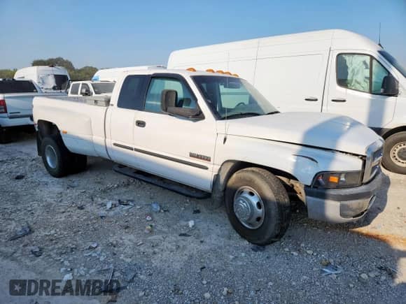 2002 Dodge 3500 с VIN 3B7MC33642M290317, выставлен на аукционе Copart как лот 69352345 с пробегом 242 793 миль миль и Списание • Salvage title. История ставок и продаж доступна на DreamBid. Изображение 4.
