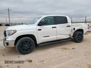 2020 Toyota Tundra SR5 with VIN 5TFEY5F18LX258743, listed as a Copart auction lot 59602865 with 105,392 mi miles and Salvage title. Bid and sale history available at DreamBid. Image 1.