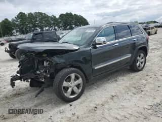 2013 Jeep Grand Cherokee Limited with VIN 1C4RJFBG9DC633229, listed as a Copart auction lot 67676525 with 147,048 mi miles and Salvage title. Bid and sale history available at DreamBid. Image 1.
