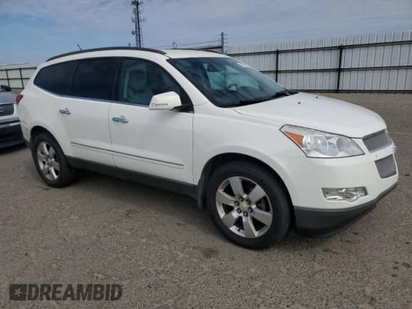 2012 Chevrolet Traverse LTZ с VIN 1GNKRLED0CJ343117, выставлен на аукционе Copart как лот 85080195 с пробегом 158 994 миль миль и Чистый • Clean title. История ставок и продаж доступна на DreamBid. Изображение 4.