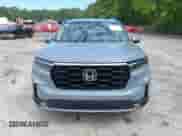 2025 Honda Pilot Touring with VIN 5FNYG2H70SB011614, listed as a IAAI auction lot 42205848 with 37,719 mi miles and . Bid and sale history available at DreamBid. Image 12.