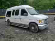 2000 Ford Econoline Cargo Recreational with VIN 1FDRE14L3YHA17676, listed as a Copart auction lot 58571465 with 174,129 mi miles and Salvage title. Bid and sale history available at DreamBid. Image 14.