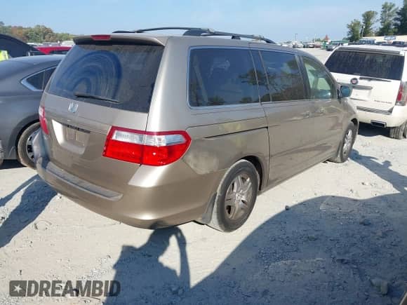 2007 Honda Odyssey EX z VIN 5FNRL38437B074662, wystawiony jako IAAI lot #40716076 z przebiegiem 228 344 mil mil oraz . Historia ofert i sprzedaży dostępna na DreamBid. Obrazek 4.