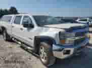 2015 Chevrolet Silverado 2500HD High Country с VIN 1GC1KXEG3FF620618, выставлен на аукционе Copart как лот 80156375 с пробегом 268 567 миль миль и Списание • Salvage title. История ставок и продаж доступна на DreamBid. Изображение 4.