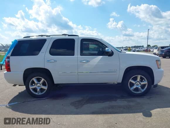 2012 Chevrolet Tahoe LTZ z VIN 1GNSKCE0XCR326361, wystawiony jako IAAI lot #42994916 z przebiegiem 158 826 mil mil oraz . Historia ofert i sprzedaży dostępna na DreamBid. Obrazek 13.
