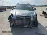 2009 Hyundai Tucson with VIN KM8JN12B59U971278, listed as a Copart auction lot 71657114 with 230,390 mi miles and Salvage title. Bid and sale history available at DreamBid. Image 5.