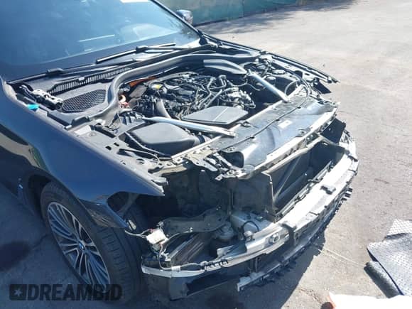 2018 BMW 5 Series 530e with VIN WBAJA9C5XJB249387, listed as a IAAI auction lot 42581237 with 122,539 mi miles and . Bid and sale history available at DreamBid. Image 17.