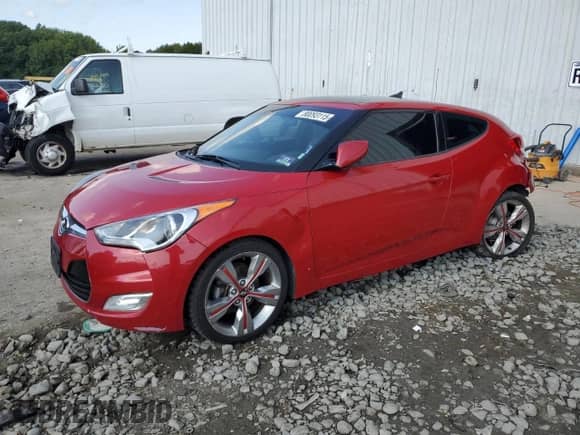 2013 Hyundai Veloster w/Black Int z VIN KMHTC6AD5DU088630, wystawiony jako Copart lot #80093115 z przebiegiem 76 327 mil mil oraz Szkoda całkowita • Salvage title. Historia ofert i sprzedaży dostępna na DreamBid. Obrazek 1.