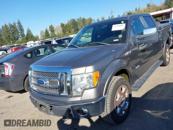 2011 Ford F-150 Lariat with VIN 1FTFW1ET1BFA82757, listed as a IAAI auction lot 43390905 with 128,796 mi miles and . Bid and sale history available at DreamBid. Image 2.