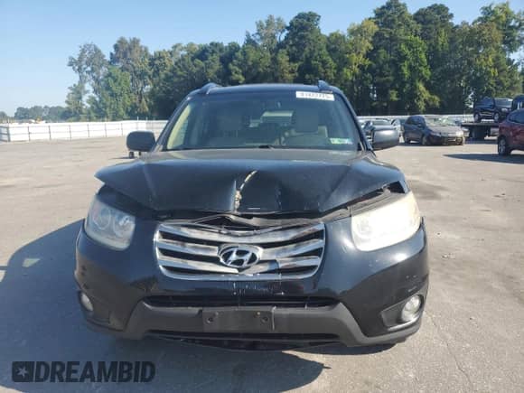 2012 Hyundai Santa Fe Limited с VIN 5XYZKDAG1CG163534, выставлен на аукционе Copart как лот 81422725 с пробегом 161 121 миль миль и Списание • Salvage title. История ставок и продаж доступна на DreamBid. Изображение 5.