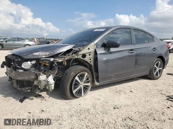 2019 Subaru Impreza Premium with VIN 4S3GKAD66K3620396, listed as a Copart auction lot 82624185 with 87,879 mi miles and Salvage title. Bid and sale history available at DreamBid. Image 1.