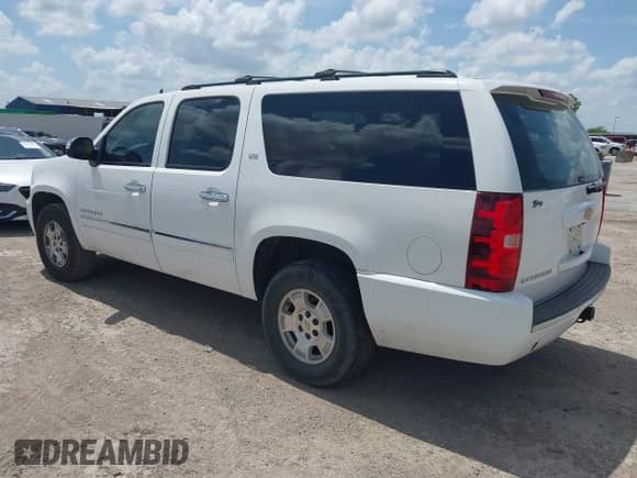 2013 Chevrolet Suburban LTZ with VIN 1GNSCKE01DR194888, listed as a IAAI auction lot 42722951 with 257,786 mi miles and . Bid and sale history available at DreamBid. Image 3.