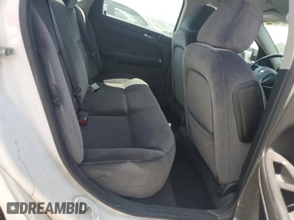 2013 Chevrolet Impala LS z VIN 2G1WF5E37D1256499, wystawiony jako Copart lot #64046055 z przebiegiem 60 522 mil mil oraz Szkoda całkowita • Salvage title. Historia ofert i sprzedaży dostępna na DreamBid. Obrazek 10.