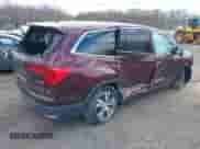 2017 Honda Pilot EX-L with VIN 5FNYF6H74HB040889, listed as a IAAI auction lot 42040094 with 84,001 mi miles and . Bid and sale history available at DreamBid. Image 4.