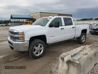 2018 Chevrolet Silverado 2500HD Work Truck with VIN 1GC1KUEG8JF111809, listed as a Copart auction lot 71122155 with 219,488 mi miles and Salvage title. Bid and sale history available at DreamBid. Image 1.
