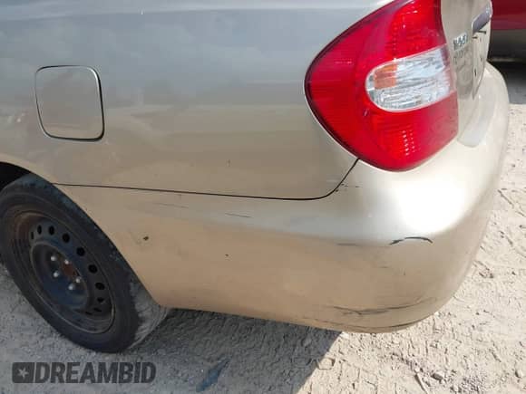 2002 Toyota Camry LE z VIN 4T1BE30K42U639339, wystawiony jako IAAI lot #42914465 z przebiegiem 384 427 mil mil oraz . Historia ofert i sprzedaży dostępna na DreamBid. Obrazek 14.