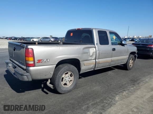 2001 Chevrolet Silverado 1500 LS z VIN 1GCEK19T81E123004, wystawiony jako Copart lot #90468215 z przebiegiem Nie podano mil oraz Czysty tytuł • Clean title. Historia ofert i sprzedaży dostępna na DreamBid. Obrazek 3.