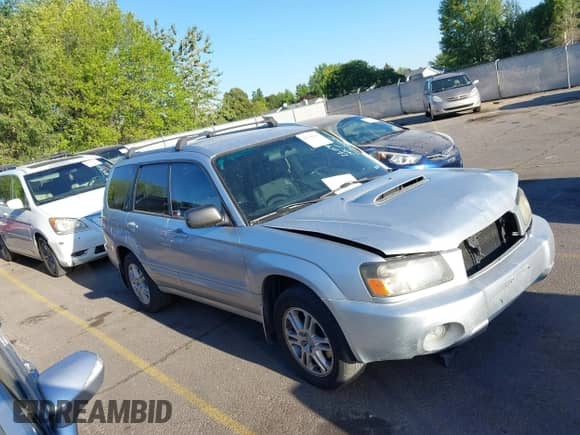 2005 Subaru Forester XT with VIN JF1SG69695H715937, listed as a IAAI auction lot 42848831 with 148,759 mi miles and . Bid and sale history available at DreamBid. Image 1.