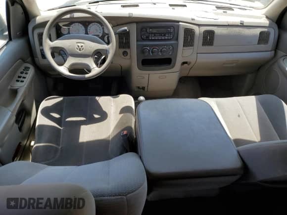 2003 Dodge 1500 ST z VIN 1D7HU18N63S101166, wystawiony jako Copart lot #68959365 z przebiegiem 130 358 mil mil oraz Szkoda całkowita • Salvage title. Historia ofert i sprzedaży dostępna na DreamBid. Obrazek 8.