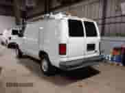 2014 Ford Econoline Cargo Commercial with VIN 1FTNE2EL6EDB13764, listed as a IAAI auction lot 42647684 with 99,876 mi miles and . Bid and sale history available at DreamBid. Image 3.