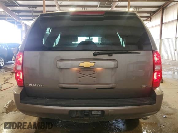 2012 Chevrolet Tahoe LS with VIN 1GNSKAE06CR227928, listed as a Copart auction lot 65878915 with 117,985 mi miles and Salvage title. Bid and sale history available at DreamBid. Image 6.