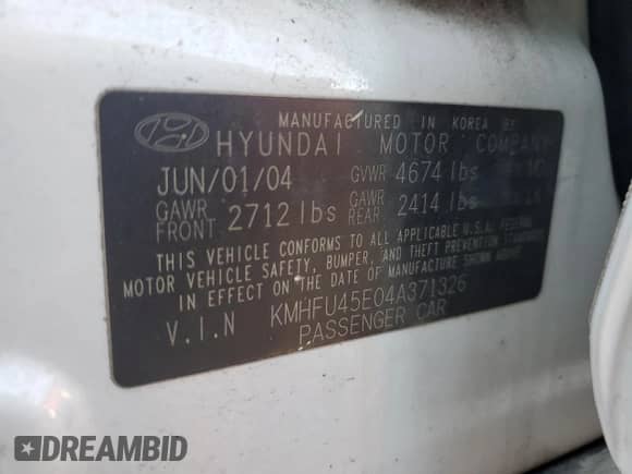 2004 Hyundai XG с VIN KMHFU45E04A371326, выставлен на аукционе Copart как лот 76480844 с пробегом Не указан миль и На запчасти • Non repairable. История ставок и продаж доступна на DreamBid. Изображение 13.