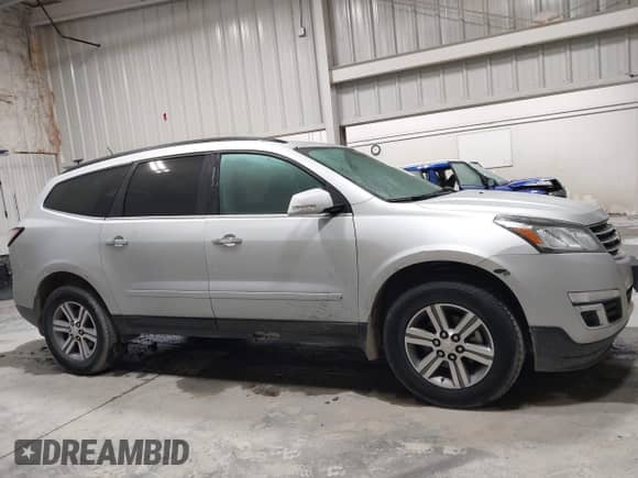 2016 Chevrolet Traverse LT z VIN 1GNKVGKD2GJ279059, wystawiony jako IAAI lot #43316781 z przebiegiem 96 018 mil mil oraz . Historia ofert i sprzedaży dostępna na DreamBid. Obrazek 13.