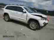 2021 Jeep Grand Cherokee Laredo E with VIN 1C4RJFAG9MC731727, listed as a Copart auction lot 69651455 with 33,180 mi miles and Salvage title. Bid and sale history available at DreamBid. Image 4.