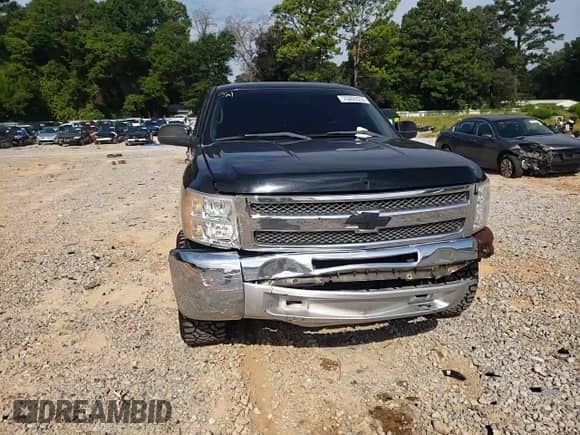 2012 Chevrolet Silverado 1500 LT с VIN 3GCPCSEA3CG112214, выставлен на аукционе Copart как лот 70205555 с пробегом 210 288 миль миль и Списание • Salvage title. История ставок и продаж доступна на DreamBid. Изображение 13.