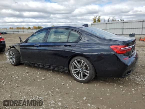 2019 BMW 7 Series 750i xDrive with VIN WBA7F2C57KB240408, listed as a Copart auction lot 75825244 with 125,702 mi miles and Salvage title. Bid and sale history available at DreamBid. Image 2.