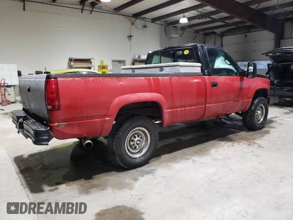 1998 Chevrolet Silverado 2500 с VIN 1GCGK24R9WZ270541, выставлен на аукционе Copart как лот 84566124 с пробегом 132 001 миль миль и Списание • Salvage title. История ставок и продаж доступна на DreamBid. Изображение 3.