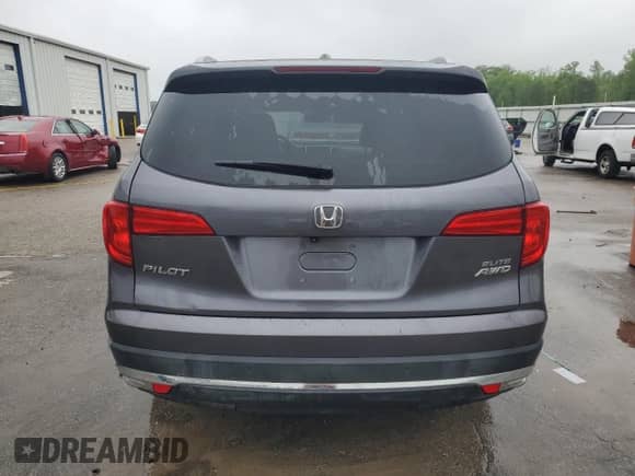 2018 Honda Pilot Elite с VIN 5FNYF6H04JB045163, выставлен на аукционе Copart как лот 52073405 с пробегом 105 897 миль миль и Списание • Salvage title. История ставок и продаж доступна на DreamBid. Изображение 6.