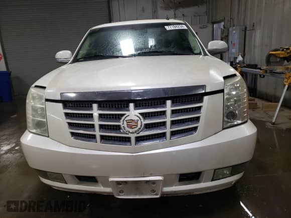 2009 Cadillac Escalade z VIN 1GYFC43569R120839, wystawiony jako Copart lot #77194234 z przebiegiem 136 425 mil mil oraz Szkoda całkowita • Salvage title. Historia ofert i sprzedaży dostępna na DreamBid. Obrazek 5.