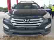 2016 Hyundai Santa Fe z VIN 5XYZW4LA2GG333757, wystawiony jako IAAI lot #42634105 z przebiegiem 97 918 mil mil oraz . Historia ofert i sprzedaży dostępna na DreamBid. Obrazek 6.
