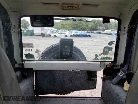 1994 Jeep Wrangler S с VIN 1J4FY19P2RP444472, выставлен на аукционе Copart как лот 80020505 с пробегом 168 245 миль миль и Списание • Salvage title. История ставок и продаж доступна на DreamBid. Изображение 10.