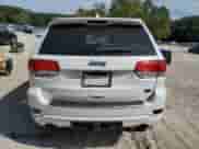 2017 Jeep Grand Cherokee Overland with VIN 1C4RJFCGXHC964499, listed as a Copart auction lot 71671795 with 117,302 mi miles and Salvage title. Bid and sale history available at DreamBid. Image 6.