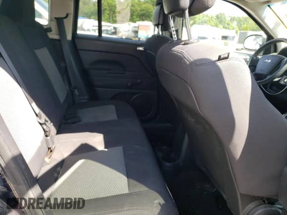 2010 Jeep Compass Sport z VIN 1J4NT1FB0AD659003, wystawiony jako Copart lot #63768104 z przebiegiem 187 670 mil mil oraz Szkoda całkowita • Salvage title. Historia ofert i sprzedaży dostępna na DreamBid. Obrazek 11.