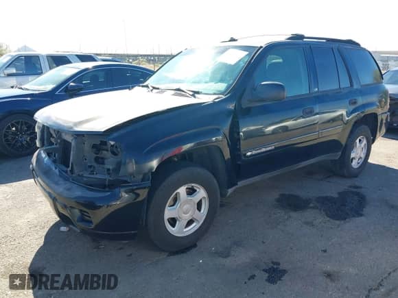 2002 Chevrolet TrailBlazer LT with VIN 1GNDT13S922433990, listed as a IAAI auction lot 41387354 with 185,525 mi miles and . Bid and sale history available at DreamBid. Image 18.