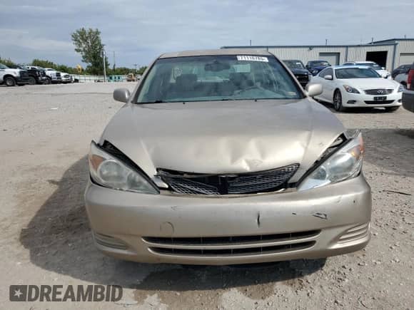 2002 Toyota Camry XLE with VIN 4T1BF32K42U025479, listed as a Copart auction lot 71116785 with 241,787 mi miles and Salvage title. Bid and sale history available at DreamBid. Image 5.