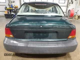 1996 Saturn SL with VIN 1G8ZH5284TZ379272, listed as a Copart auction lot 72447734 with 73,264 mi miles and Non repairable. Bid and sale history available at DreamBid. Image 6.